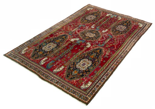 Corner detail of 2000s Shiraz rug showing border pattern and Wool pile