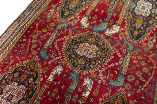 Backside of handmade 2000s Shiraz rug showing knot structure and weave density