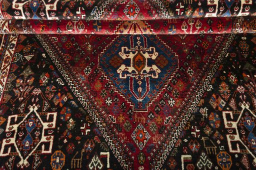 Full view of 2000s Shiraz rug from Iran / Persia, 277 × 181 cm in Red tones