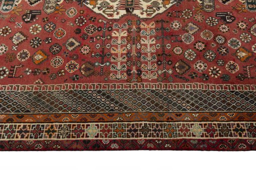 Corner detail of 2000s Shiraz rug showing border pattern and Wool pile