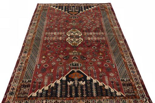 Surface texture of 2000s Shiraz rug with natural Wool and intricate pattern