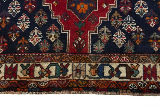 Close-up detail of 2000s Shiraz rug from Iran / Persia showing Wool weave