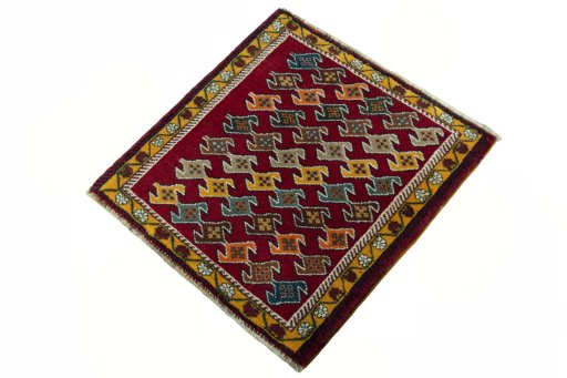 Corner detail of 2000s Shiraz rug showing border pattern and Wool pile