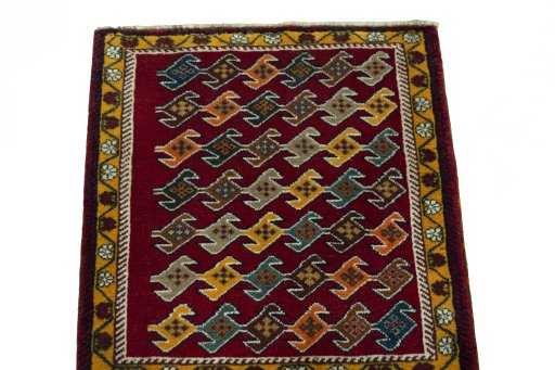 Surface texture of 2000s Shiraz rug with natural Wool and intricate pattern
