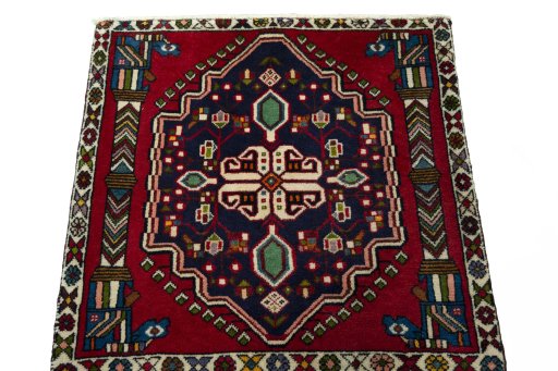 Surface texture of 2000s Shiraz rug with natural Wool and intricate pattern