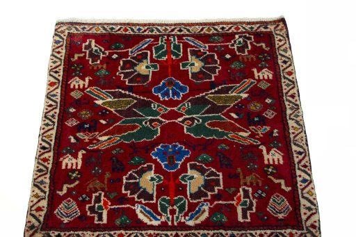 Surface texture of 2000s Shiraz rug with natural Wool and intricate pattern