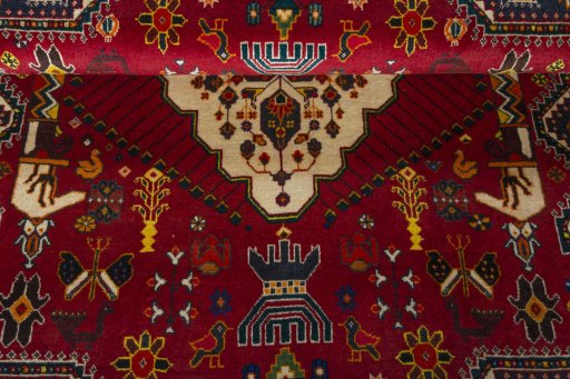 Corner detail of 2000s Shiraz rug showing border pattern and Wool pile