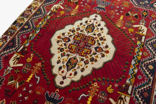 Backside of handmade 2000s Shiraz rug showing knot structure and weave density
