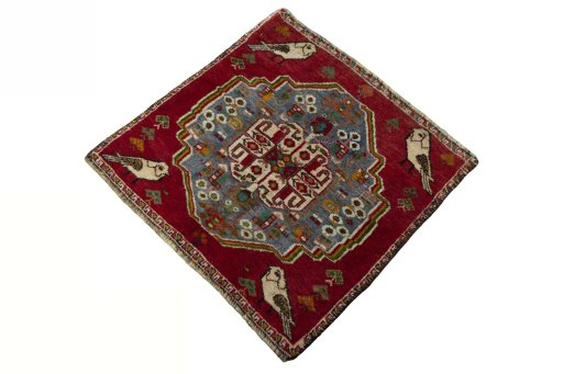 Corner detail of 2000s Shiraz rug showing border pattern and Wool pile