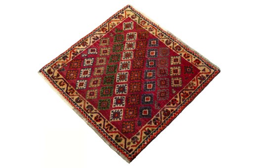 Corner detail of 2000s Shiraz rug showing border pattern and Wool pile