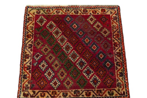 Surface texture of 2000s Shiraz rug with natural Wool and intricate pattern