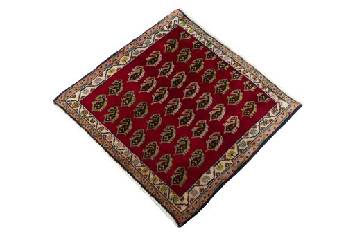 Corner detail of 2000s Shiraz rug showing border pattern and Wool pile