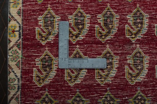 Backside of handmade 2000s Shiraz rug showing knot structure and weave density