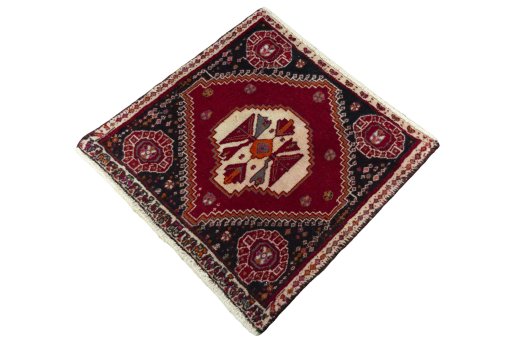 Corner detail of 2000s Shiraz rug showing border pattern and Wool pile