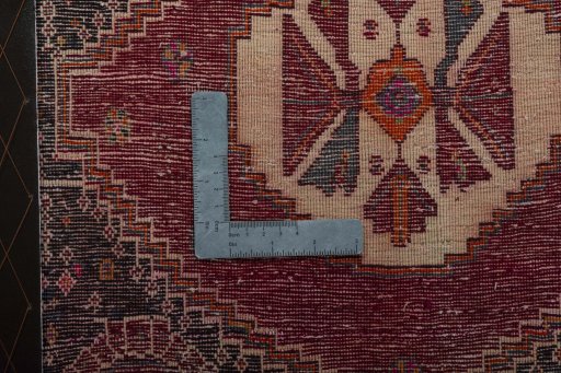 Backside of handmade 2000s Shiraz rug showing knot structure and weave density