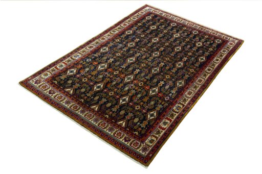 Corner detail of 2000s Shiraz rug showing border pattern and Wool pile