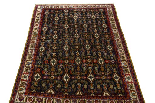 Surface texture of 2000s Shiraz rug with natural Wool and intricate pattern
