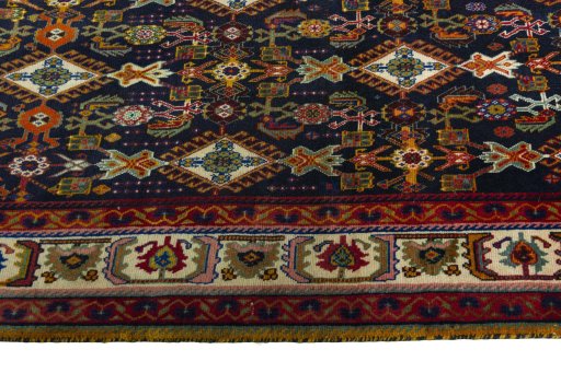 Close-up detail of 2000s Shiraz rug from Iran / Persia showing Wool weave