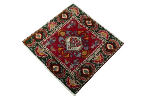 Corner detail of 2000s Shiraz rug showing border pattern and Wool pile