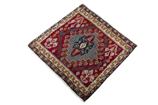 Corner detail of 2000s Shiraz rug showing border pattern and Wool pile