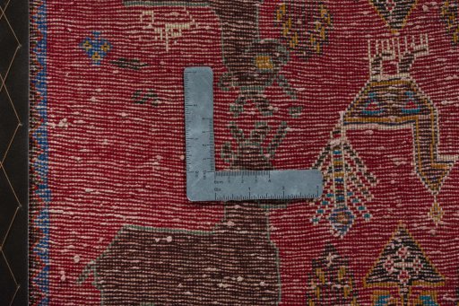 Backside of handmade 2000s Shiraz rug showing knot structure and weave density