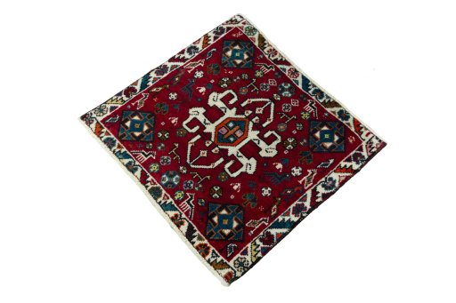 Corner detail of 2000s Shiraz rug showing border pattern and Wool pile