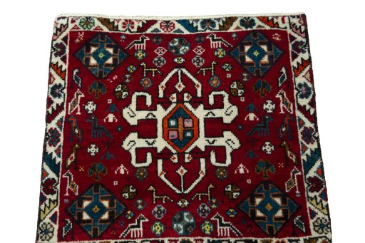 Surface texture of 2000s Shiraz rug with natural Wool and intricate pattern