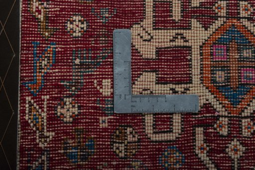 Backside of handmade 2000s Shiraz rug showing knot structure and weave density