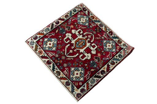 Corner detail of 2000s Shiraz rug showing border pattern and Wool pile