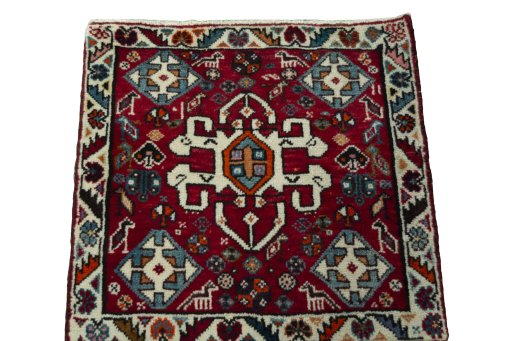 Surface texture of 2000s Shiraz rug with natural Wool and intricate pattern