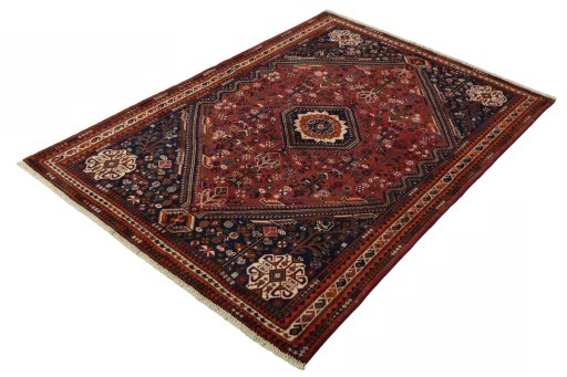 Corner detail of 2000s Shiraz rug showing border pattern and Wool pile