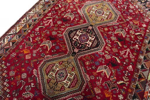 Backside of handmade 2000s Shiraz rug showing knot structure and weave density