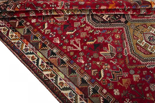 Full view of 2000s Shiraz rug from Iran / Persia, 266 × 180 cm in Red tones
