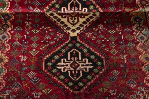 Full view of 2000s Shiraz rug from Iran / Persia, 264 × 172 cm in Red tones