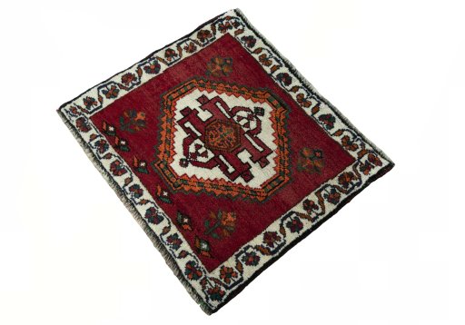 Corner detail of 2000s Shiraz rug showing border pattern and Wool pile