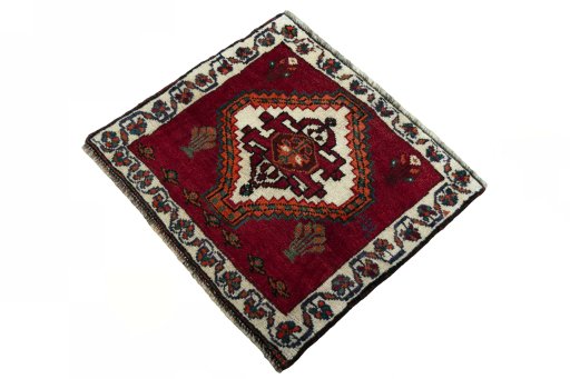 Corner detail of 2000s Shiraz rug showing border pattern and Wool pile