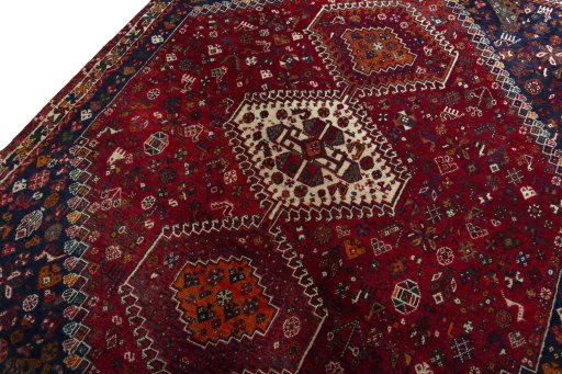 Backside of handmade 2000s Shiraz rug showing knot structure and weave density