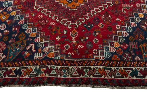 Central medallion detail of 2000s Shiraz rug from Iran / Persia