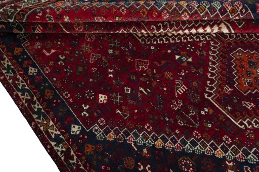 Full view of 2000s Shiraz rug from Iran / Persia, 215 × 175 cm in Red tones