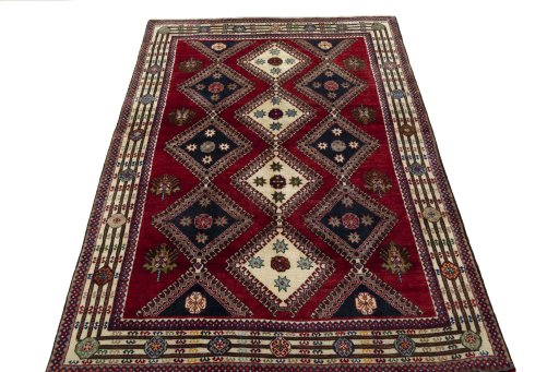 Surface texture of 2000s Shiraz rug with natural Wool and intricate pattern
