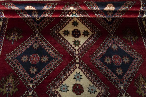 Full view of 2000s Shiraz rug from Iran / Persia, 252 × 173 cm in Red tones