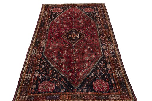 Surface texture of 1970s Shiraz rug with natural Wool and intricate pattern