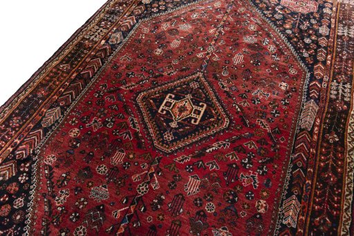 Backside of handmade 1970s Shiraz rug showing knot structure and weave density