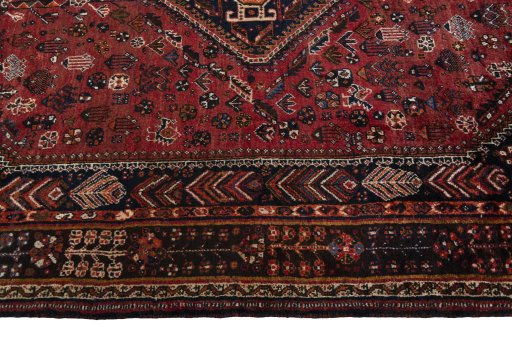 Full view of 1970s Shiraz rug from Iran / Persia, 284 × 173 cm in Red tones