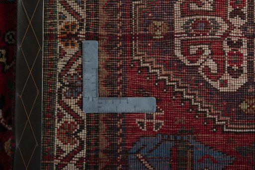 Surface texture of 2000s Shiraz rug with natural Wool and intricate pattern