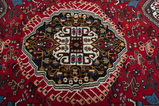Central medallion detail of 2000s Shiraz rug from Iran / Persia