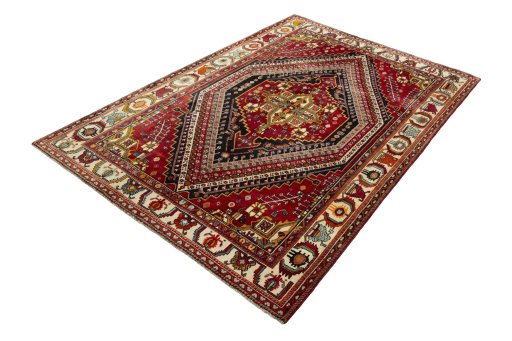 Corner detail of 2000s Shiraz rug showing border pattern and Wool pile