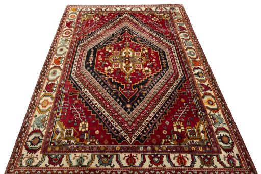Surface texture of 2000s Shiraz rug with natural Wool and intricate pattern