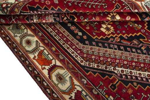 Full view of 2000s Shiraz rug from Iran / Persia, 305 × 206 cm in Red tones