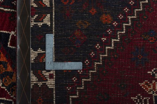 Close-up detail of 2000s Shiraz rug from Iran / Persia showing Wool weave